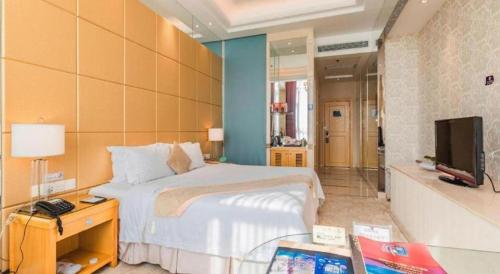 Postel nebo postele na pokoji v ubytování Regency Hotel