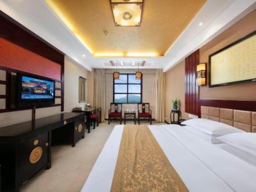 Postel nebo postele na pokoji v ubytování Dengfeng Chanwu Hotel