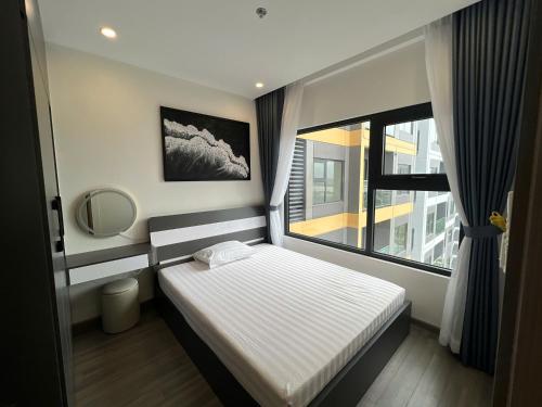 Ένα ή περισσότερα κρεβάτια σε δωμάτιο στο Vicky Apartment