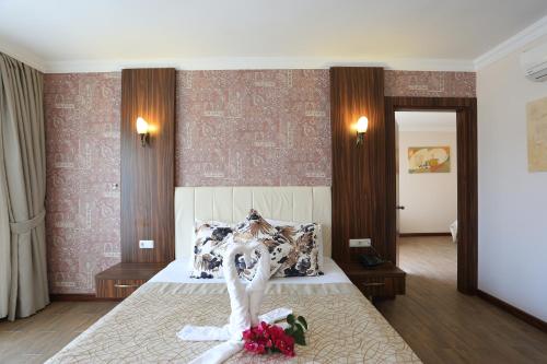 Katil atau katil-katil dalam bilik di Tymnos Hotel