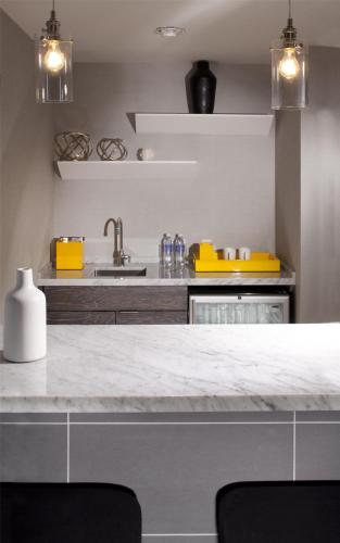 a kitchen with a counter top and a sink at Hyatt Regency Los Angeles International Airport in Los Angeles