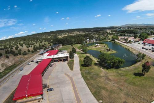 an aerial view of a train station and a lake at Super 8 by Wyndham Newcastle in Newcastle