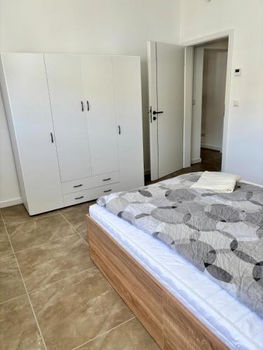 Ένα ή περισσότερα κρεβάτια σε δωμάτιο στο BnB Schweinfurt