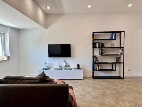Μια τηλεόραση ή/και κέντρο ψυχαγωγίας στο BnB Schweinfurt
