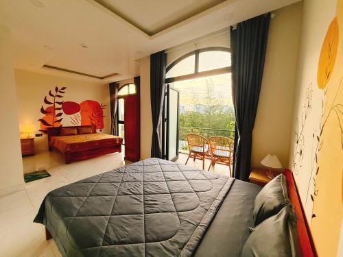 Postel nebo postele na pokoji v ubytování Pavilion Coffee and Homestay