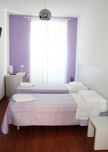 Una cama o camas en una habitación de Smart Accomodation