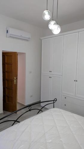 Ένα ή περισσότερα κρεβάτια σε δωμάτιο στο Casa Melody