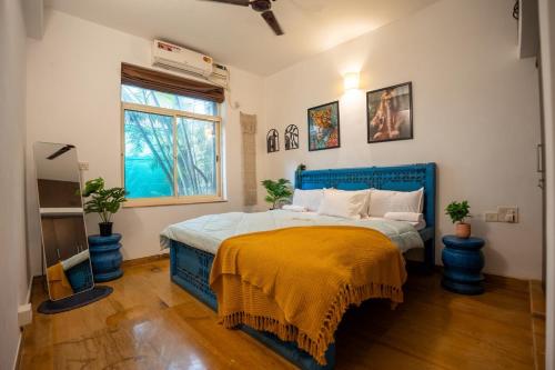 Ένα ή περισσότερα κρεβάτια σε δωμάτιο στο Ayati Retreat A Tropical Hideaway