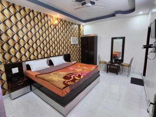 Ένα ή περισσότερα κρεβάτια σε δωμάτιο στο Hotel Royal Galaxy