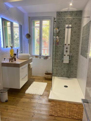Koupelna v ubytování Chambre pivoine chez l habitant