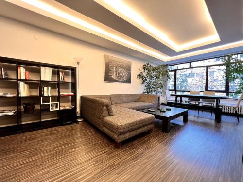 a living room with a couch and a coffee table at LXRY Apt Bestekar Avenue at the heart of Ankara in Ankara