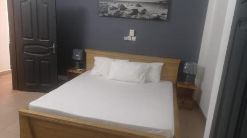 Postel nebo postele na pokoji v ubytování VeVeLeFranc