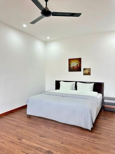 Cama o camas de una habitación en Richico Hoi An Villas