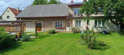 a house with a yard in front of it at Ubytovací zařízení Orlíček Černíkovice čp 145 in Černíkovice