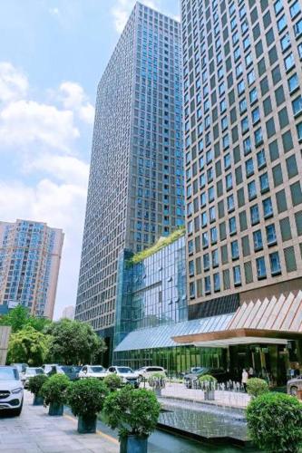 a group of tall buildings in a city at Chongqing Forest Design B&B in Chongqing