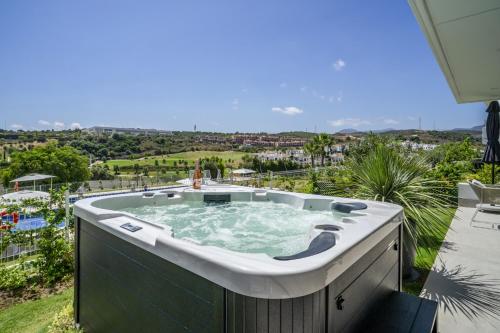 Fabuloso apartamento con jardín privado y jacuzzi.