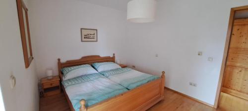 Ένα ή περισσότερα κρεβάτια σε δωμάτιο στο Osserapartment Green