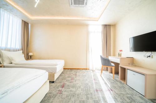 Cama o camas de una habitación en Hotel Alexandar Lux