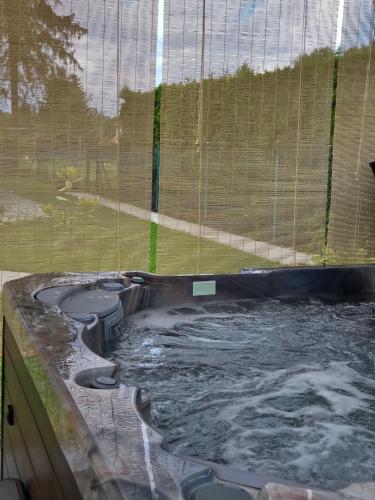 Φωτογραφία από το άλμπουμ του Domek Komfort z jacuzzi przy Parku Zdrojowym σε Rabka