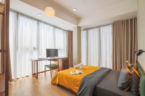 Postel nebo postele na pokoji v ubytování Vừng Hotel