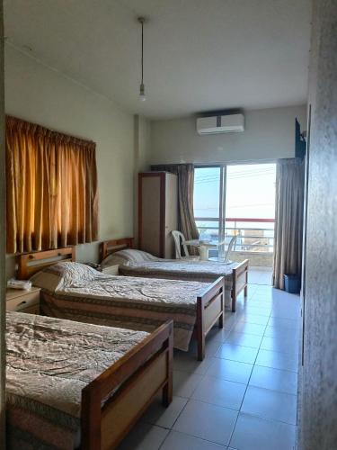 Postel nebo postele na pokoji v ubytování Edward v hotel