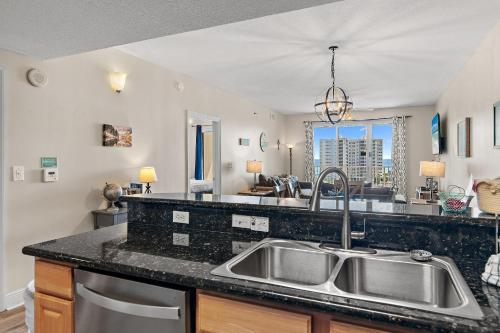 a kitchen with a sink and a counter top at Ariel Dunes II 703 in Destin