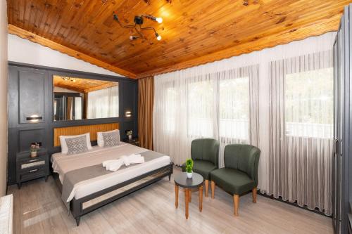 Postel nebo postele na pokoji v ubytování Lagertha Hotel Taksim