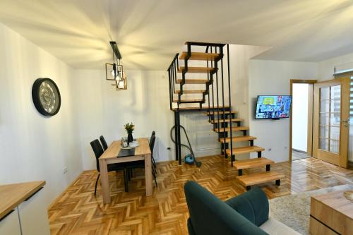 TV/Unterhaltungsangebot in der Unterkunft Apartman CENTAR