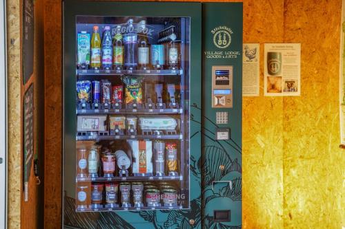 a vending machine filled with lots of drinks at Gästesuite im Stöckelkeller bei Bayreuth 