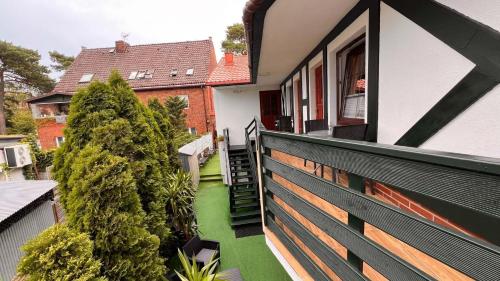 an empty balcony of a house with a fence at Pokoje Wczasowe Barbara in Ustka