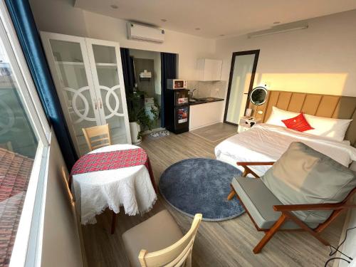 Ein Bett oder Betten in einem Zimmer der Unterkunft CHARM CHARM - kimmy housing - 48 To Ngoc Van