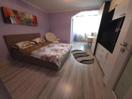 Postel nebo postele na pokoji v ubytování Garsoniera-studio in Zalău