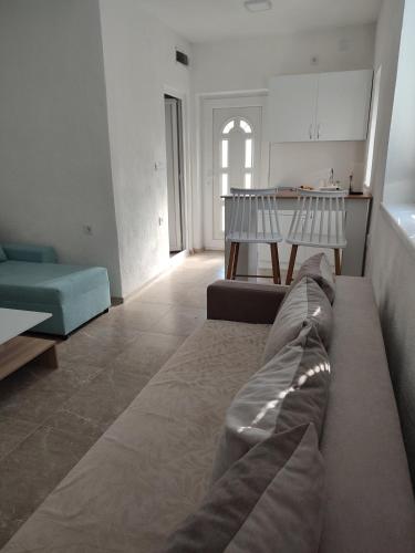 Ένα ή περισσότερα κρεβάτια σε δωμάτιο στο Vila Lazovi