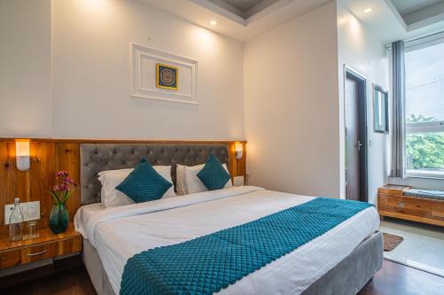 Postel nebo postele na pokoji v ubytování Alaya Stays Impreza Luxury Stays