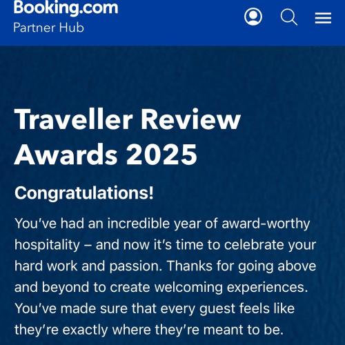 a sign that says travel review awards at The Hideout in Carbis Bay