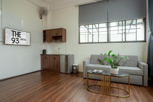 a living room with a couch and a table at The 93 Hostel in Ho Chi Minh City