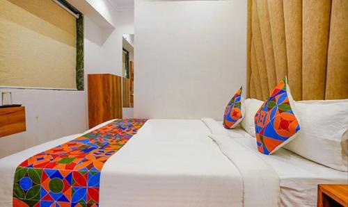 Voodi või voodid majutusasutuse Hotel New Deepak toas