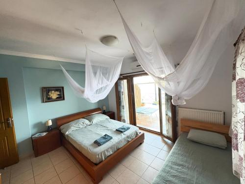 Ένα ή περισσότερα κρεβάτια σε δωμάτιο στο Casa Sabine