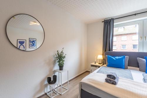 Ένα ή περισσότερα κρεβάτια σε δωμάτιο στο Apartmenthaus in Neumünster