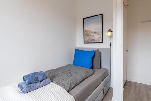 Ένα ή περισσότερα κρεβάτια σε δωμάτιο στο Apartmenthaus in Neumünster