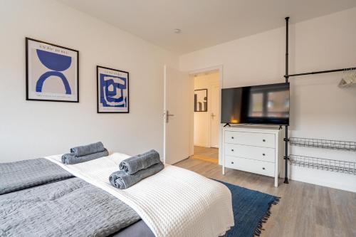 Ένα ή περισσότερα κρεβάτια σε δωμάτιο στο Apartmenthaus in Neumünster