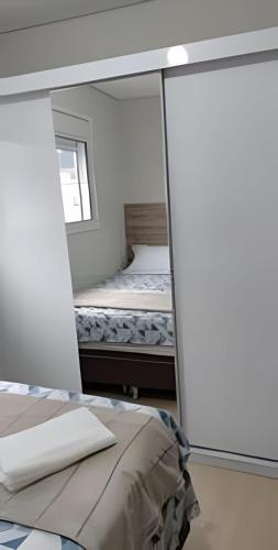 Katil atau katil-katil dalam bilik di Apartamento POP Panazzolo