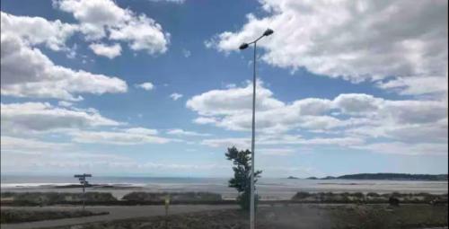 a street light on the side of a road at 284 - Room 8 - Beachfront - Fantastic Sea views in Swansea