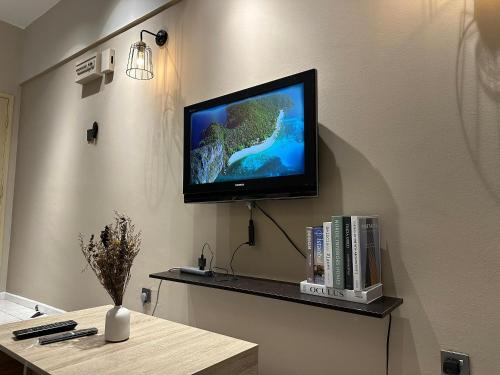 TV a/nebo společenská místnost v ubytování PD Paradise Lagoon Apartment