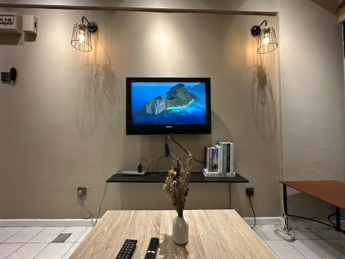 TV a/nebo společenská místnost v ubytování PD Paradise Lagoon Apartment