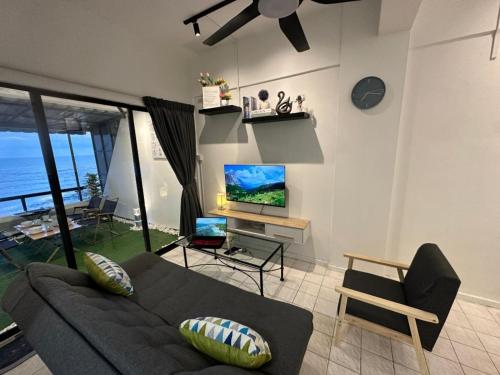 TV a/nebo společenská místnost v ubytování PD Paradise Lagoon Apartment