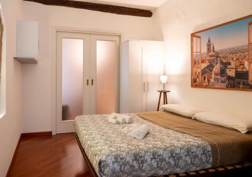 Ένα ή περισσότερα κρεβάτια σε δωμάτιο στο Bergamo Alta - Charm & History