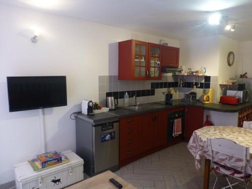 Kuchyň nebo kuchyňský kout v ubytování Duplex des Merveilles