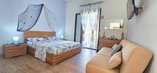 Ένα ή περισσότερα κρεβάτια σε δωμάτιο στο A Nica