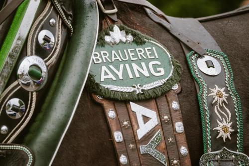 a brown shirt with the words brauer alive on it at Gasthof zur Post in Bad Wiessee